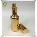 Garrafa luxuosa da bomba da imprensa do ouro do vidro 50ml geado com bomba do ouro